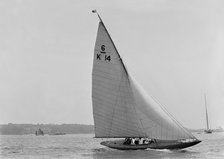 The 6 Metre sailing yacht 'Margaret' (K14) sailing upwind, 1921. Creator: Kirk & Sons of Cowes.