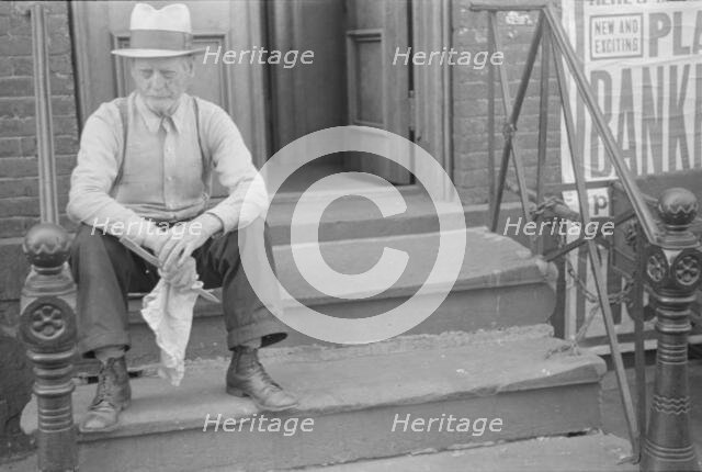 A tenant, 61st Street between 1st and 3rd Avenues, New York, 1938. Creator: Walker Evans.