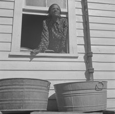 Woman who takes in laundry for a living, Daytona Beach, Florida, 1943. Creator: Gordon Parks.