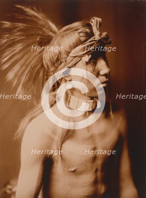 Shows As He Goes, half-length portrait, c1905. Creator: Edward Sheriff Curtis.