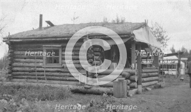 Log cabin, between c1900 and 1916. Creator: Unknown.