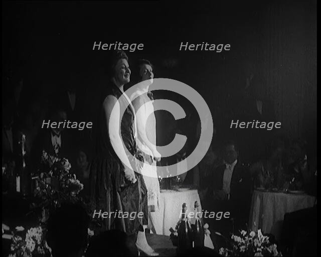 Two Female Civilians Singing Together On a Stage, 1924. Creator: British Pathe Ltd.