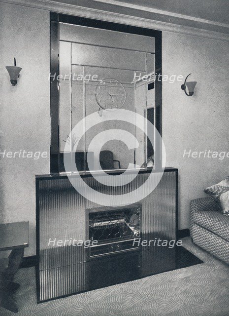 'Electric fireplace and overmantel by James Clark & Son Ltd.', 1940. Artist: Unknown.