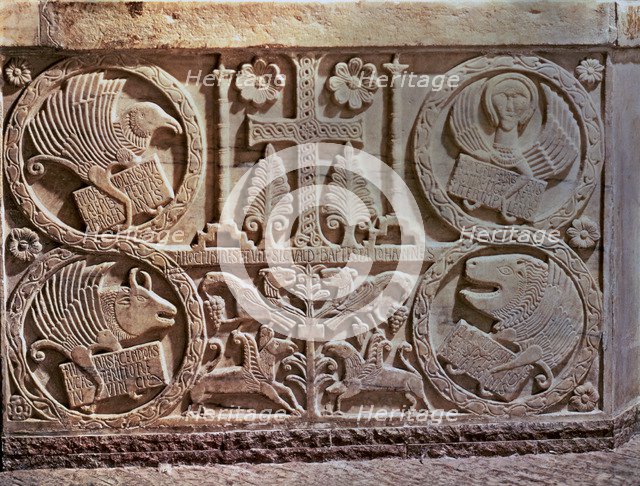 Bas-relief from the Baptistery of Saint Calixto (737-756). Detail of stucco with the symbols of t…