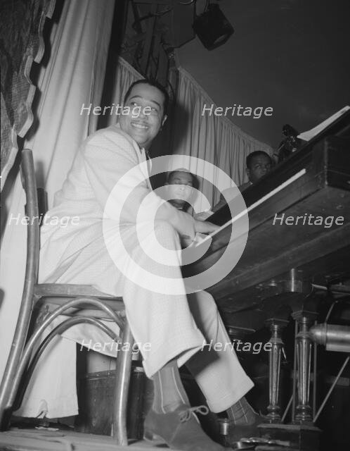 Duke Ellington, orchestra leader, New York, 1943. Creator: Gordon Parks.