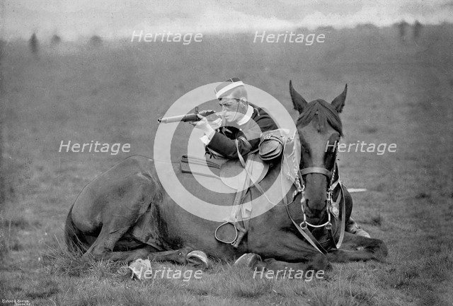 A dismounted lancer at a skirmishing display, 1896. Artist: Gregory & Co