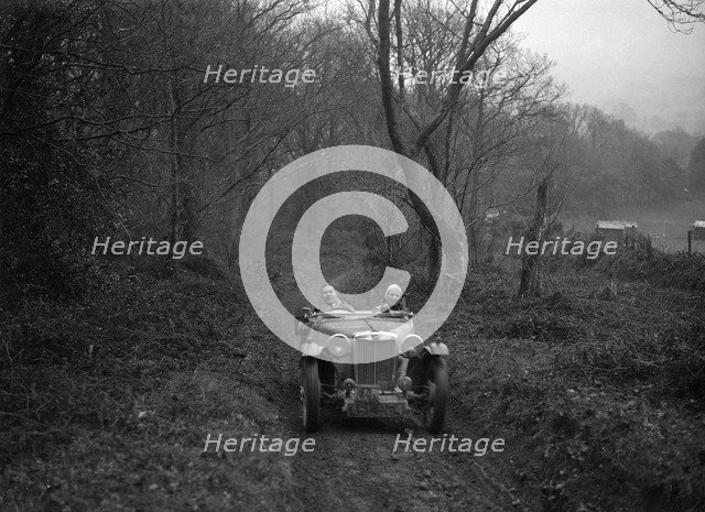 1936 MG TA taking part in a motoring trial, late 1930s. Artist: Bill Brunell.