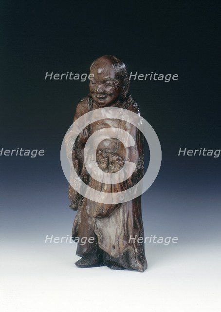 Wooden Liu Hai figure with three-legged toad, early Qing dynasty, China, c18th century. Artist: Unknown