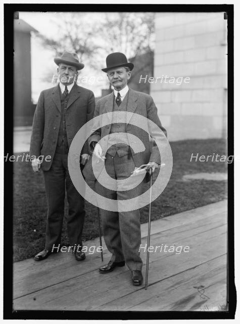 Thomas Riley Marshall (right) with unidentified man, between 1913 and 1917. Creator: Harris & Ewing.