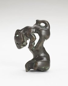 Ornament in the form of a feline-like animal on a foot-shaped stand, Han dynasty, 206 BCE-220 CE. Creator: Unknown.