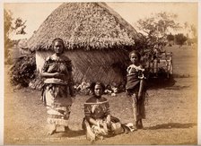 Nuku'alofa, Tonga: three Tongan women in front of a traditional hut, c1870s. Creator: Burton Brothers.