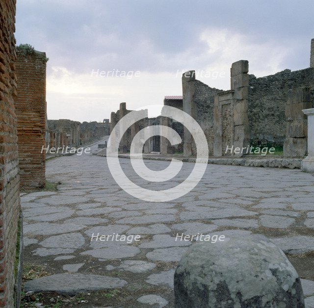 A cobblestone Roman road in Pompeii, Italy. Creator: Unknown.