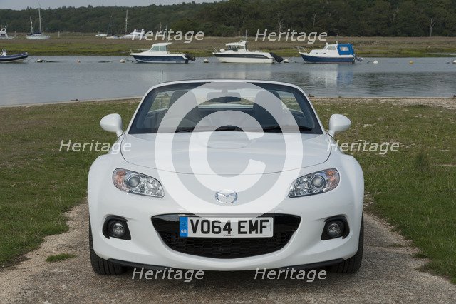 2014 Mazda MX5 Roadster Coupe Artist: Unknown.