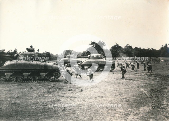 American tank and troops attack Périers, Normandy, July 1944. Artist: Unknown