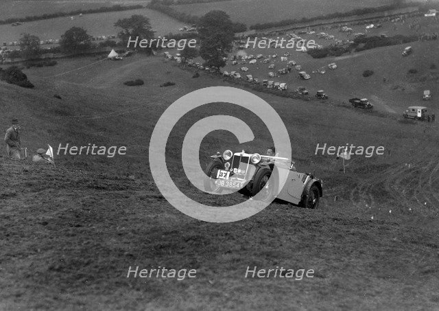 MG PA of the Cream Cracker team competing in the MG Car Club Rushmere Hillclimb, Shropshire, 1935. Artist: Bill Brunell.