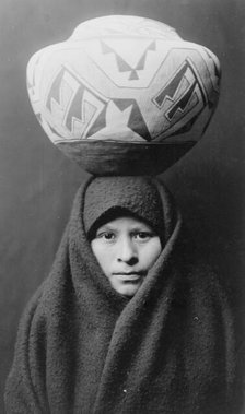 Zuni girl with jar, c1903. Creator: Edward Sheriff Curtis.
