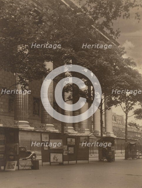 City street with columns of a building and hoardings, 1918-1920s. Creator: Eunice Harriett Garlick.