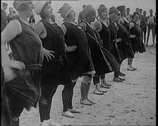 A Group of Plus Size Female Civilians Exercising on a Beach, 1920. Creator: British Pathe Ltd.