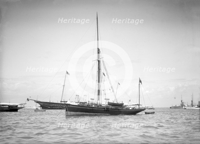 The yawl 'Beluga' at anchor, 1911. Creator: Kirk & Sons of Cowes.