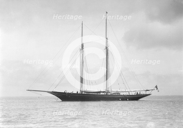 The schooner 'Allah Karim' at anchor, 1912. Creator: Kirk & Sons of Cowes.