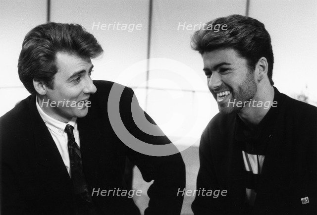 George Michael, British pop singer, and Jonathan Ross, British comedian and TV personality. Artist: Unknown