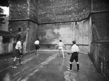 Playing fives, King's School, Ely, Cambridgeshire, 1920-1939. Artist: Marshall Keene and Company.