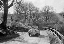 Kay Petre's Singer Nine competing in the RAC Rally, 1939. Artist: Bill Brunell.