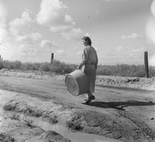 In a migratory labor camp, California, 1936. Creator: Dorothea Lange.