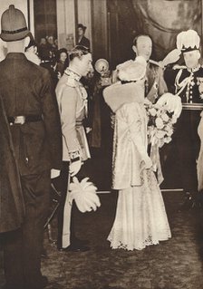 'King George VI and Queen Elizabeth leaving a luncheon in honour of coronation', 1937. Artist: Unknown.