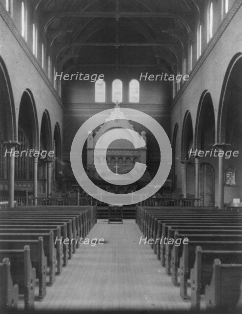 Interior of St. Marks church, Washington, D.C. - view down center aisle toward altar, c1900. Creator: Frances Benjamin Johnston.