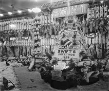 Swifts butchers, Smithfield Market, London, 1928. Artist: Bedford Lemere and Company