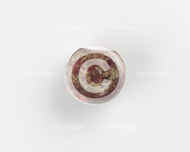 A round marker for games. Chipped, Roman period, (3rd-4th century?). Creator: Unknown.