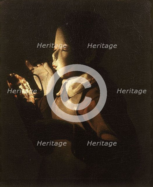 Boy Blowing at Lamp. Artist: La Tour, Georges, de (1583-1652)