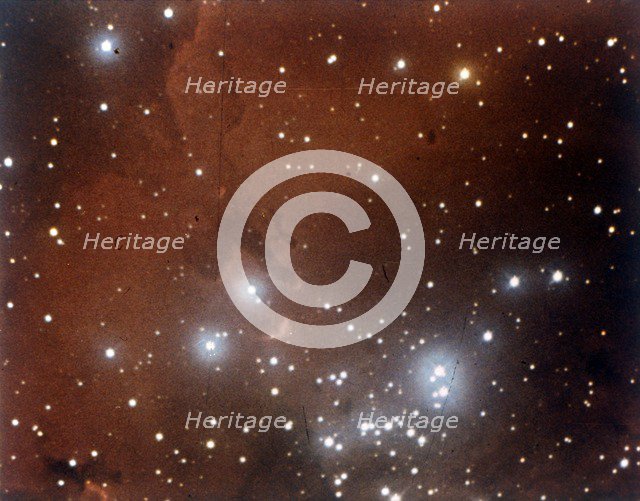 Nebulosity and star cluster in Serpens. Creator: NASA.