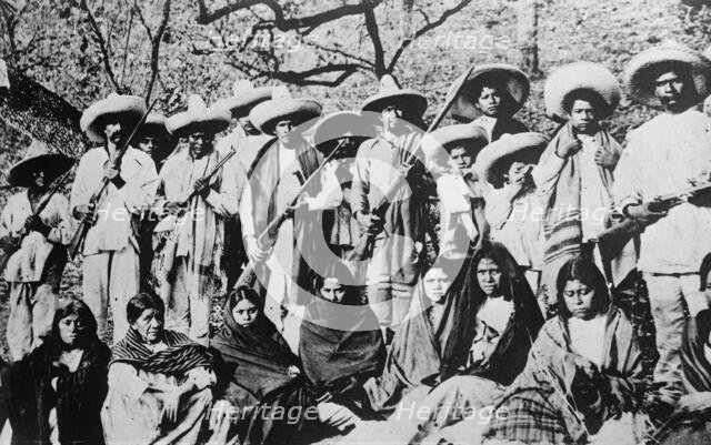 Insurrectos & their women, Mexico, between c1910 and c1915. Creator: Bain News Service.