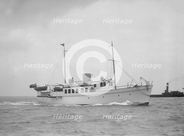 The 71 ton motor yacht 'Romana' under way, 1936. Creator: Kirk & Sons of Cowes.