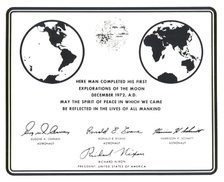 Replica of the plaque left on the Moon by Apollo 17 astronauts, 1972.  Creator: NASA.