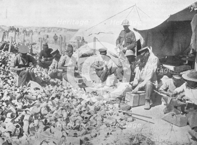 'Making bombs out of tin cans in Gallipoli', 1915. Artist: Unknown.