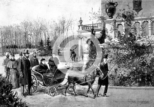 The Queen's Visit to...Friedrichshof: the Empress showing Her Majesty...the Castle grounds, 1895. Creator: George Meisenbach.