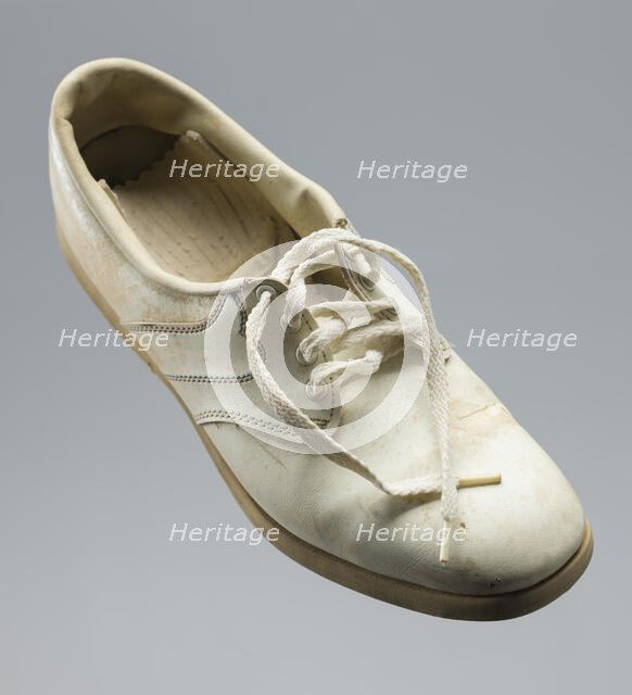 Golf shoe belonging to Ethel Funches, late 20th century. Creator: FootJoy.