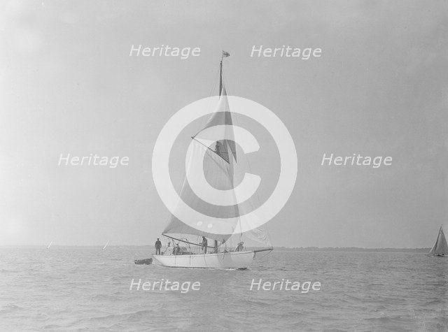 The cutter 'Mavourneen' running downwind, 1922. Creator: Kirk & Sons of Cowes.
