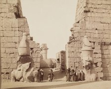 Entrance to Temple of Luxor with Colossal Statues of Luxor, East Bank Ramesses, between 1860 & 1903. Creator: Antonio Beato.