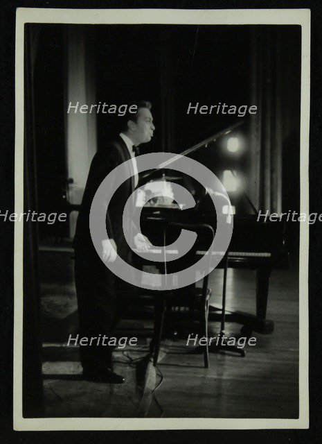 Mel Torme (vocals) in concert at the Bristol Hippodrome, 1950s. Artist: Denis Williams