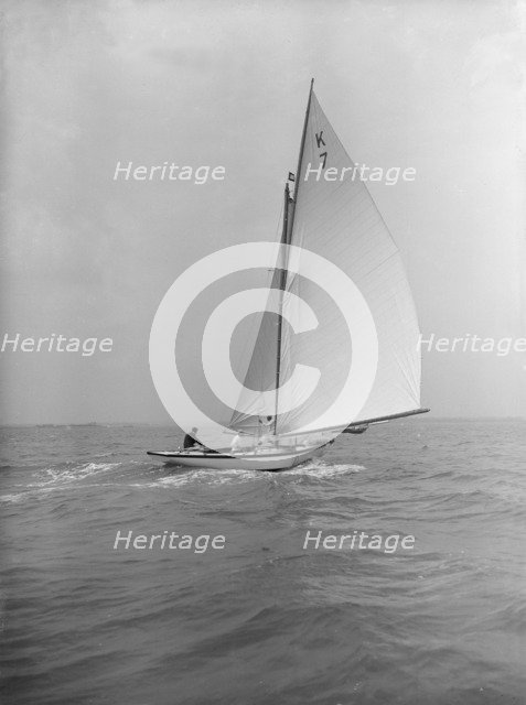 The 7 Metre 'Ginerva' (K7) under sail, 1912. Creator: Kirk & Sons of Cowes.