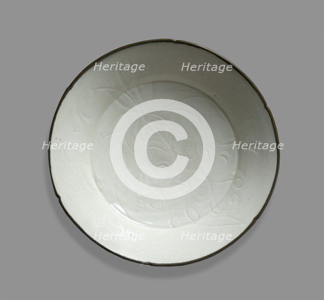 White ware dish with lotus decoration, 12th century Artist: Unknown.