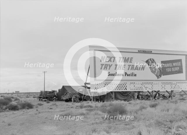 Three families camped on the plains along US 99 in California, 1938. Creator: Dorothea Lange.