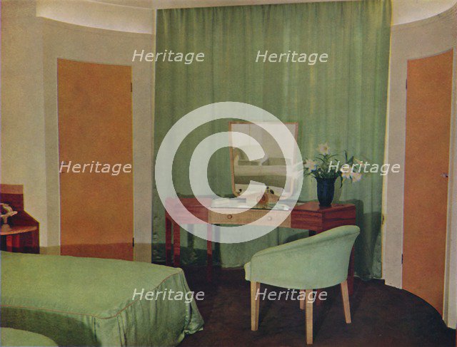 'A bedroom in a house at Portland Place, designed  by Ian Henderson & Co. of London', 1935. Artist: Unknown.