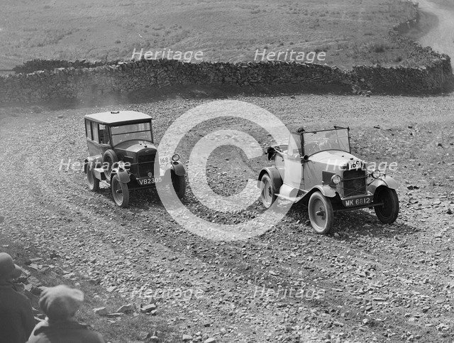Trojan saloon and tourer competing in the MCC Edinburgh Trial, 1929. Artist: Bill Brunell.