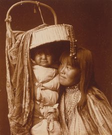 Apache girl and papoose, c1903. Creator: Edward Sheriff Curtis.