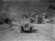 Singer 9 sports saloon competing in the Mid Surrey AC Barnstaple Trial, Beggars Roost, Devon, 1934. Artist: Bill Brunell.